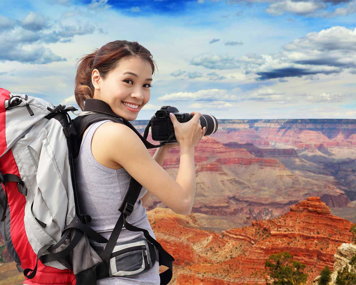 woman overlooking geological formations of the southerwestern united states