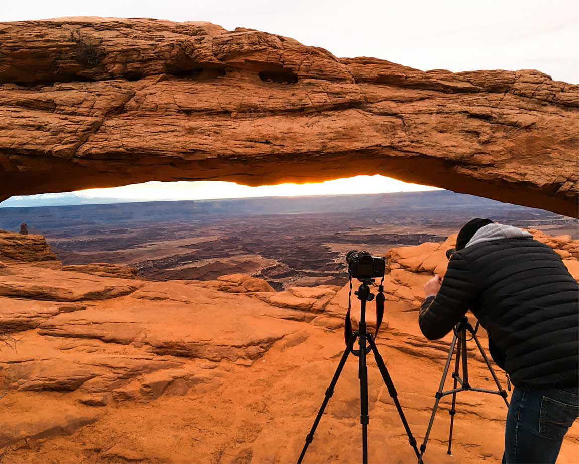 photographer taking photo of southwest canyonlands